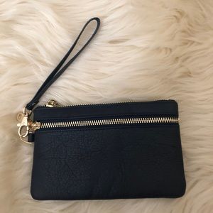 Clutch new in leather